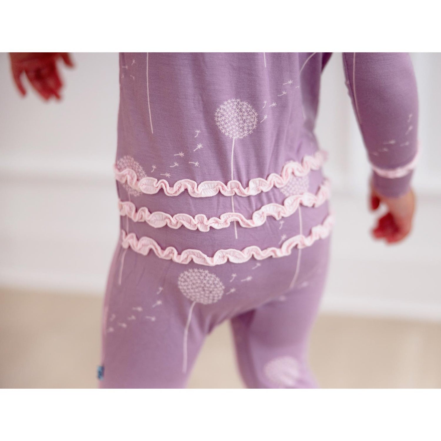 Print Muffin Ruffle Footie with 2 Way Zipper in Lavender Dandelion Wish (359977)
