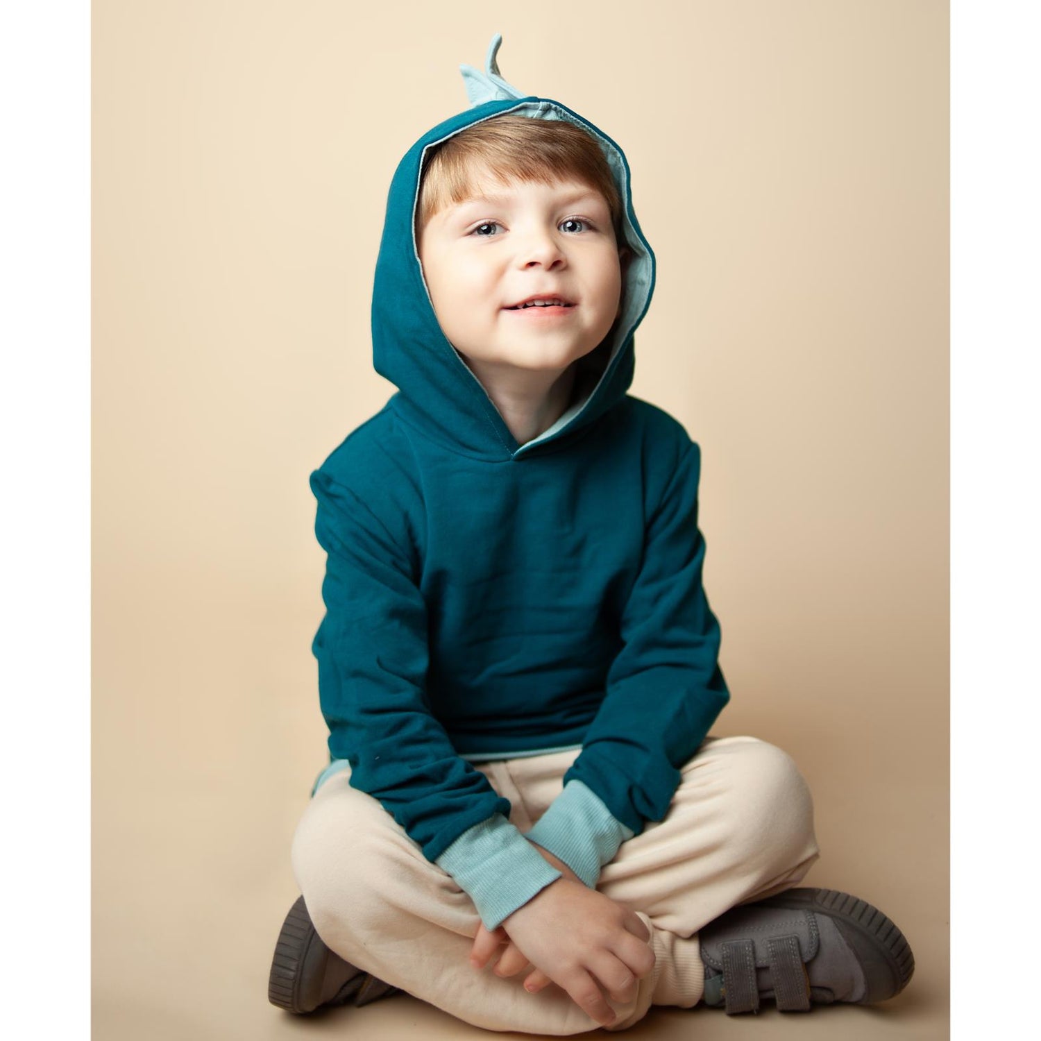 Fleece Kangaroo Pocket Pullover with Dino Spikes in Peacock with Stormy Sea (355998)