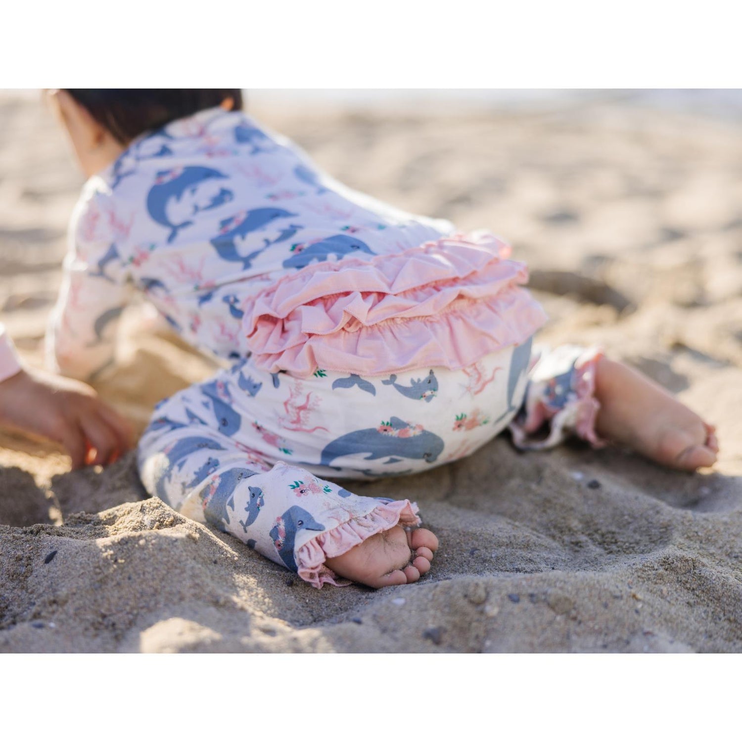 Print Oh La La Ruffle Romper in Natural Dolphins